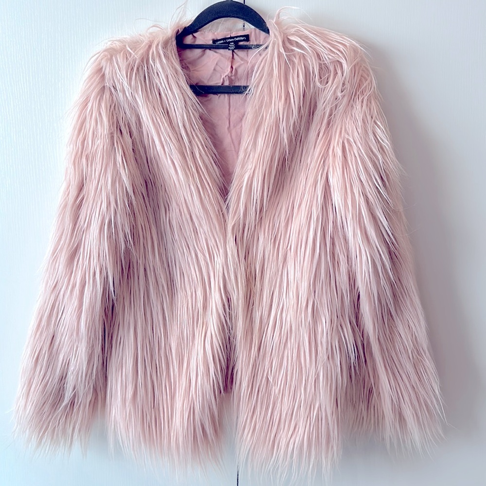 Pink faux fur jacket.